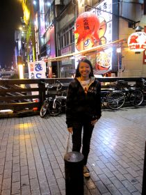 my niece (kim) behind  her is one popular takoyaki store  near don quixote