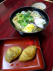 inari sushi with a bowl of ramen