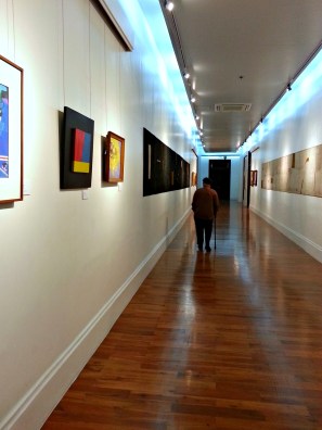 i love this shot! that man is f. sionil jose the national artist for literature. he is on his way to dimasalang exhibit...