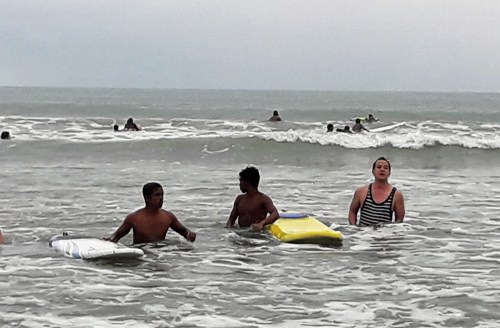 as usual someone needs to carry my surf board for me. hahaha!